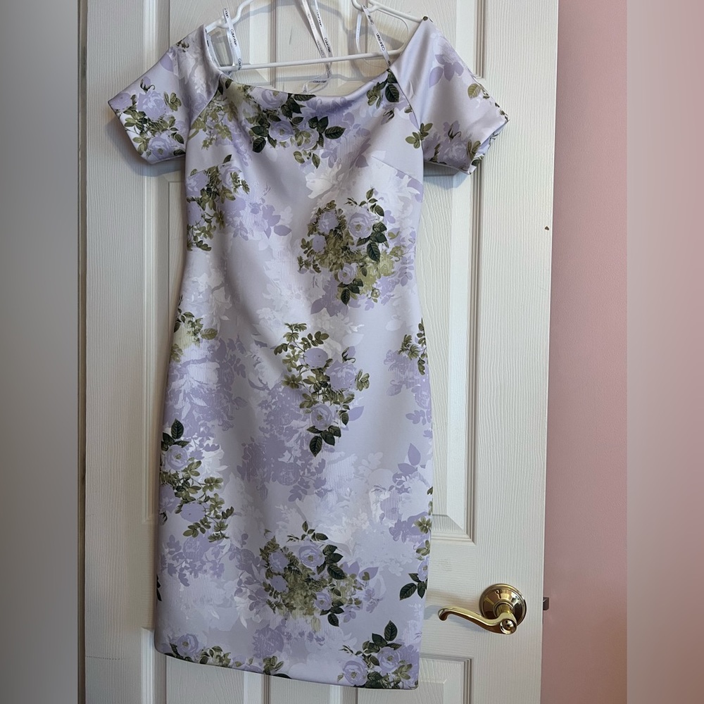 Calvin Klein off Shoulder Floral Dress with sleeves. Dress is slim fitted.